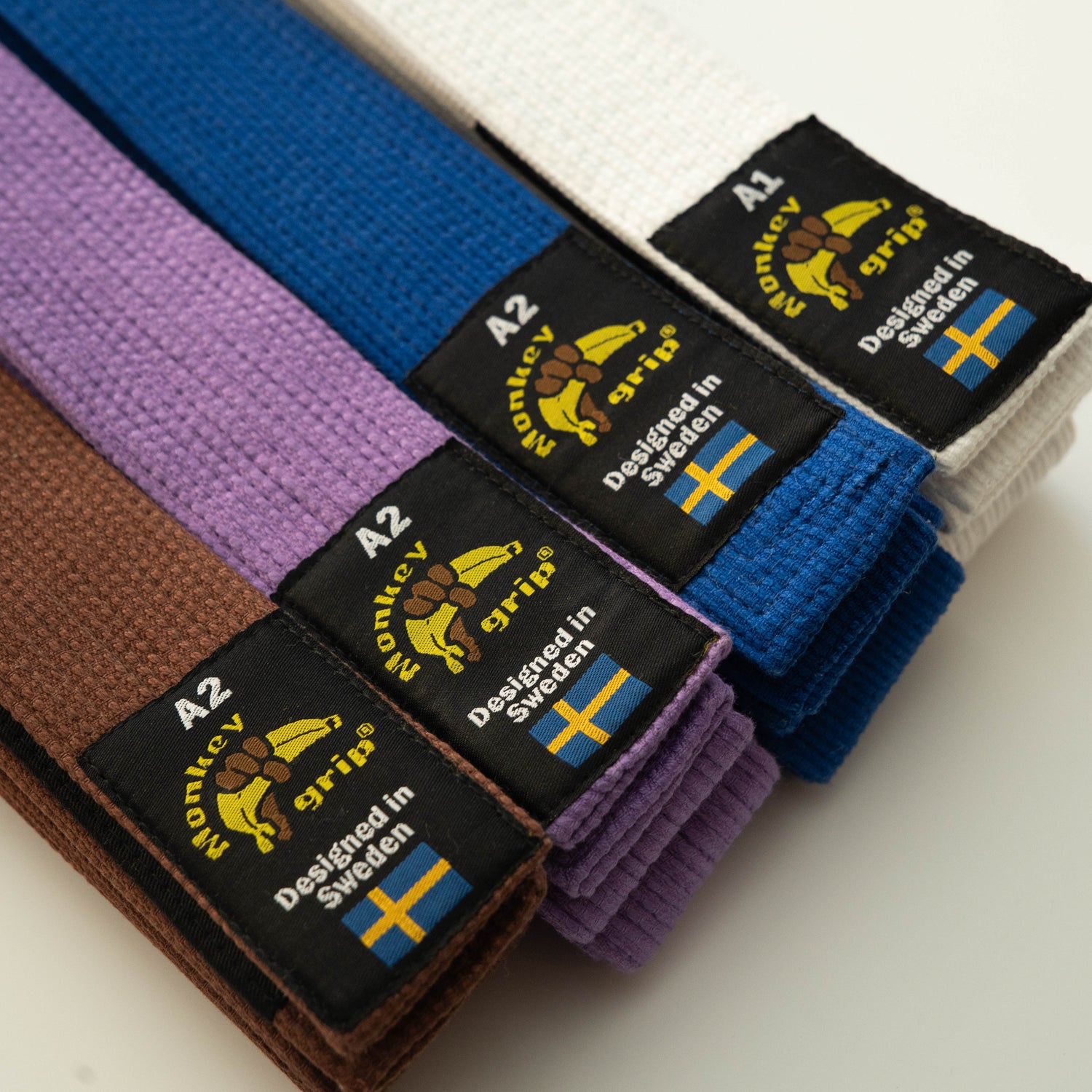 Monkey Grip BJJ bälte pearl weave - vit blå lila brun